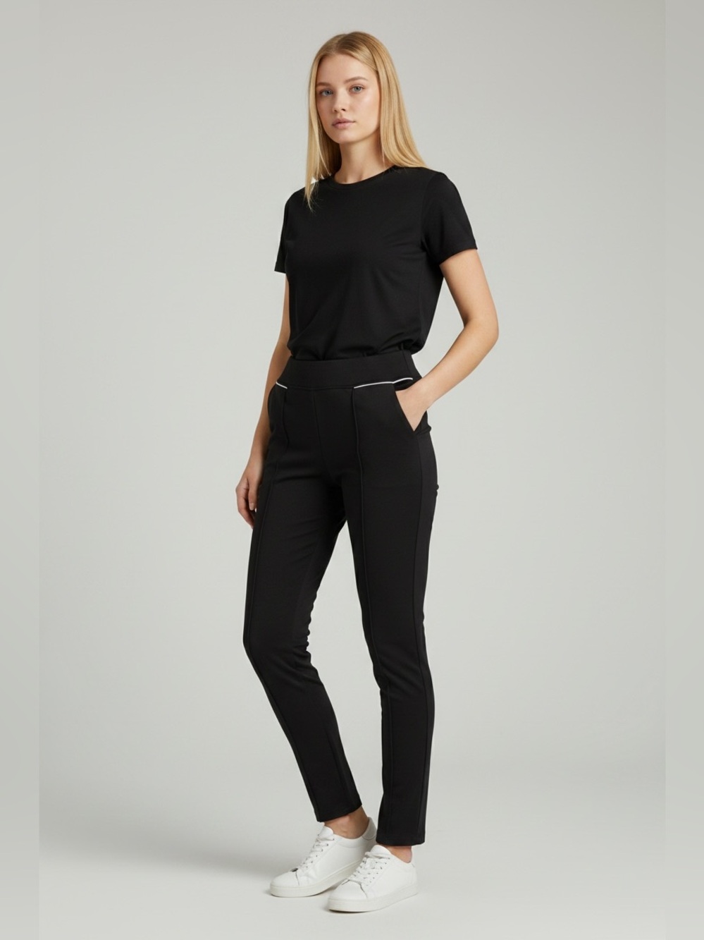 Lark + Grey black rayon, nylon & spandex pants with white piping on pockets,